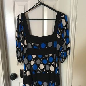 Cocktail length, multi-colored women's dress.